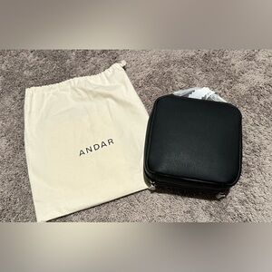 ANDAR — The Charlotte Black Togo